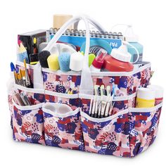 the large organizer is filled with many different types of pens, markers and pencils