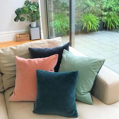 velvet cushions pink, teal and duck egg