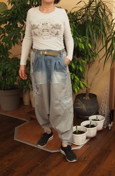 Wide Linen Denim Pants plus size harem pants  pants custom made wide leg pants handmade COMFORT.  Very comfortable harem pants. Unique shalwars in combination of linen with jeans. Great for travel, yoga, daytime walks and evening parties, everywhere you want to feel comfortable and chic. Generously slouchy. Relaxed fit, drop crotch. Draped silhouette. This model is wearing size XL / 165 cm I hope you will enjoy taking a look at my other work. The list will be growing in the coming days, so stay tuned : S     US S 4-6,     UK 10-12,   It 40-42. Fr 36-38 M    US S 8-10,    UK 14-16,  It 44-46, Fr 40-42 L     US S 12-14,   UK 18-20,  It 48-50, Fr 44-46 XL   US S 16-18,  UK 20-22,  It 50-52,Fr 46-48 XXL US S 20-22, UK 24-26, It 52-54, Fr 48-50 3XL US S 24-26, UK 28-30, It 54-56, Fr 50-52 If yo Plus Size Harem Pants, Pants Unique, Pants Custom, Pants Denim, Loose Trousers, Large Sweaters, Wide Leg Linen Pants, Pantalon Large, Knitted Poncho