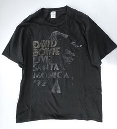 a black t - shirt with the words david bowle and santa monica on it