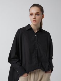 Editor's notesSoft and drapery, this shirt features boxy silhouette with button fastenings through front. It is accentuated with voluminous high-low hem. - Soft and drapery- Boxy silhouette- Button fastenings through front- High-low hem- Versatile stylingMeasurements(in.)Size One Size(XS-M)- Shoulder: 13.78 in - Bust: 33.46 in - Sleeve: 23.23 in - Length: 25.98 in - 29.92 in Composition & Care- 65% Rayon, 35% Cotton - Dry Cleaning or Machine Wash Designer- Modern Oversized Button-up Blouse, Modern Oversized Blouse For Office, Oversized Shirttail Hem Top For Office, Modern Oversized Blouse With Button Cuffs, Modern Oversized Top With Button Cuffs, Modern Oversized Tops With Button Cuffs, High Low Hem, High & Low, High Low