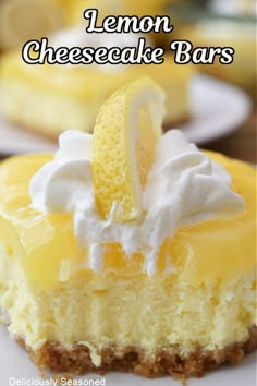 lemon cheesecake bars with whipped cream on top