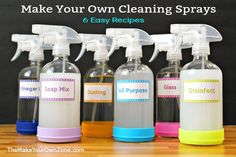 six disinfect spray bottles on a table with the words make your own cleaning sprays