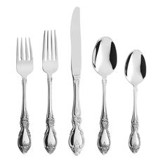 an assortment of silverware including forks, knives and spoons on a white background