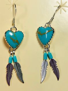 *Brand New * Handmade item *925 Sterling silver * Gemstone: Kingman Turquoise * Heart 2 feathers Earrings *Dangle drop Earrings *Free gift box *Free shipping in USA *Ready to ship *Thank you for looking and check out more items in my Etsy shop for more great items and deals! *Https://www.etsy.come/shop/abq925 Feathers Earrings, Heishi Necklace, Heart Earring, Handmade Earrings Beaded, Turquoise Bead Necklaces, Turquoise Heart, Earring Handmade, Southwestern Jewelry, Silver Feather