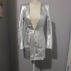 Silver Leather V-Neck Mini Dress. Fully Lined, Padded Shoulders And Zippered Back. Get Your Holiday Dress Now. Holiday Dress, Leather Dress, Holiday Dresses, Colorful Dresses, Mini Dress, V Neck, Womens Dresses, Silver, Leather