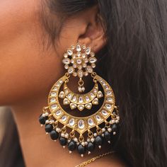 Introducing our exquisite Gold Chandbali Earrings, a perfect blend of traditional charm and modern elegance. Adorned with radiant Kundan stones and delicate pearls, these earrings are a true testament to the rich heritage of Indian and Pakistani jewelry. Ideal for bridesmaids and special occasions, their intricate design and shimmering gold finish will elevate any outfit. Embrace the timeless beauty and sophistication of our Gold Chandbali Earrings, a must-have addition to your jewelry collectio Big Kundan Earrings, Gold Chandbali Earrings, Gold Chandbali, Chandbali Earrings, Traditional Earrings, Pakistani Jewelry, Kundan Earrings, Fancy Jewellery, Lovely Earrings