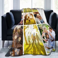 a couch with a blanket on it that has pictures of people and trees in the background