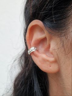 "Silver cuff earring - this is a no-piercing thick ear cuff. This fake cartilage hoop huggie cuff earring is a unique non-piercing jewelry piece. This hoop cuff earring is a great addition to your ear jewelry. While it is minimalist in style, it makes a chic and trendy look. It is decorated with dots to enhance its presence and add a unique texture and look. You do not need a piercing to wear this fake cartilage earring! Simply slide it from the thin part of the ear to its middle part (the carti Ear Parts, Cuff Earring, Cartilage Hoop, Wrap Earrings, Cartilage Earring, Middle Part, Ear Cuffs, Fine Jewelry Collection, Lovely Earrings