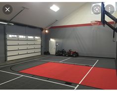 an indoor basketball court with two atvs parked in the middle and one on the floor