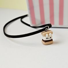 This bunny s'more necklace will make a cute treat for Easter or anyone who has a sweet tooth. 🐇 Bunny S'more charm is approx. 1.5 cm in height (1 inch).  🍫 All my pieces are handmade so they might be slightly different from the one pictured. Charm Necklaces, One Pic, Sweet Tooth, Charm Necklace, 1 Inch, Necklace Etsy, The One, Etsy Accessories, Portugal