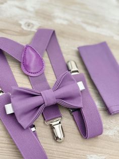 Your special guy will look so handsome when he shows up in his Dark Wisteria Purple bow tie, pocket square and suspenders! Great set for groomsman, best man or ring bearers - This bow tie & suspenders set is a great choice for family photos, wedding, ring bearer outfit, birthday celebration or any other special occasion. When making a purchase, you can choose from the following options : -Suspenders Only -Bow Tie Only. -Suspenders + Bow Tie Set. - Pocket Square only. -3 Pieces Set : bow tie + su Purple And Black Ring Bearer, Lavender Suspenders, Purple Ring Bearer, Purple Suspenders And Bow Tie, Family Photos Wedding, Lavender Bow Tie, Wedding Ring Bearer Outfit, Wisteria Purple, Wedding Ring Bearer