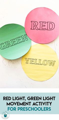 three different colored paper circles with the words red, yellow and green on them