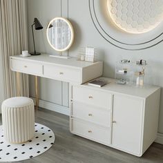 a white desk with two round mirrors above it