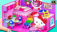 a hello kitty doll house with furniture and accessories