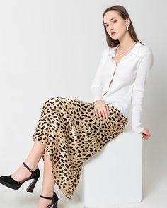 The leopard print silk midi skirt is not only versatile but also a stylish choice recently. Made with 100% 19 Momme mulberry silk, it enhances the innate charm of leopard print, adding a touch of femininity and grace. SIZE: CM / INCH SIZE Waist Hips Length XXS 58 / 22.83" 89 / 35.04" 90 / 35.43" XS 62 / 24.41" 94 / 37.01" 91 / 35.83" S 66 / 25.98" 99 / 38.98" 92 / 36.22" M 70 / 27.56" 104 / 40.94" 93 / 36.61" L 76 / 29.92" 110 / 43.31" 94 / 37.01" XL 82 / 32.28" 117 / 46.06" 95 / 37.40" XXL 88 / Chic Leopard Print Skirt For Spring, Chic Leopard Print Skirt For Fall, Chic Leopard Print Skirt, Leopard Print Silk Skirt, Elegant Leopard Print Skirt, Silk Bias-cut Skirt, Fall Leopard Print Midi Skirt, Satin Leopard Skirt, Chic Leopard Print Midi Skirt