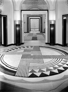 an art deco hallway in black and white