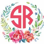 a watercolor floral wreath with the letter s in it's center and an initial on