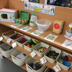 several baskets and bowls on a shelf in a child's playroom with toys