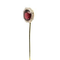 A fine antique Edwardian stickpin  In 14k gold with a platinum frame to the head.  Bezel-set with a richly colored oval-cut garnet gemstone.  Simply a wonderful period piece!  Date: Early 20th Century  Overall Condition: It is in overall good, as-pictured, used estate condition.   Condition Details: The pin head and frame are in good condition. There is some wear to the pin stem with noticeable scratches. Otherwise, there is some light edge wear, some fine and light surface scratches, and other Heirloom Oval Gemstone Brooches, Oval Art Deco Brooch For Formal Occasions, Oval Art Deco Brooches For Formal Occasions, Art Deco Formal Oval Brooches, Antique Oval Cabochon Brooch For Formal Occasions, Heirloom Oval Brooch For Formal Occasions, Formal Round Gemstone Brooches, Luxury Oval Brooches For Formal Occasions, Classic Oval Brooches For Collectors