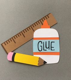 a pencil, ruler and eraser with the word glue on it