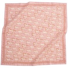 a pink scarf with horses on it