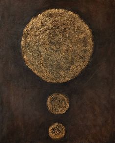 an abstract painting with two circles in the middle and one circle at the bottom, on a brown background