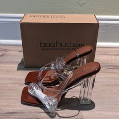 Nwot On Trend Clear Strappy High Heel Open Toe Sandals Ready For A Summer Wedding Or Date Night. Square See Through Heel Makes These Shoes Sexy Yet Comfortable. Square Toe With Patent Faux Leather Foot Bed. Size 10. Original Box, Never Worn, Only One Shoe Actually Tried On. Chic Sandals With Transparent Straps And Block Heel, Trendy Sandals With Transparent Straps For Beach, Trendy Beach Sandals With Transparent Straps, Beach Sandals With Transparent Straps And Open Toe, High Heel Synthetic Heels With Transparent Straps, Beach Sandals With Transparent Straps, White High Heel Sandals With Clear Strap, High Heel Sandals With Clear Strap For Night Out, Sandals With Transparent Straps And Block Heel