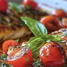 grilled chicken with tomatoes and basil on the side