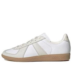 This adidas BW Army 'Cream White' is a classic sneaker from the 70s, with a vintage feel. Its simple design features a leather upper and a gum sole, with laces for a secure fit. It's perfect for everyday wear, and its timeless silhouette is sure to turn heads. This sneaker is part of the adidas BW Army series, inspired by the classic style of the 70s. With its cream and white colorway, this sneaker is sure to be a timeless addition to your wardrobe. (SNKR/Skate/Unisex/Low Top/Wear-resistant) Sporty Cream Skate Shoes With Vulcanized Sole, Adidas Bw Army Outfit, Cream Sporty Sneakers For Skateboarding, Cream Leather Skate Shoes For Sports, Classic White Skate Shoes With Three Stripes Branding, Classic White Skate Shoes With Three Stripes, Classic White Adidas Skate Shoes, White Leather Skate Shoes With Three Stripes, Adidas White Skate Shoes With Vulcanized Sole