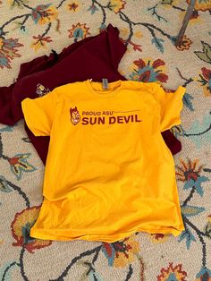 "Arizona Sun Devils Sparky t  Golden yellow  Great condition  Front says: Proud ASU Sun Devil Back has devils Anthem  GPSA USG Gilden label M  Measures:  36\" chest 27\" long" Vintage Cardigan Sweater, Label M, University Shirt, Sun Devils, Prince Purple Rain, School Tees, Retro Tee, College University, Vintage Cardigan