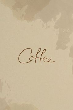 the word coffee is written in cursive writing on a white background with brown spots