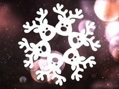 the snowflakes are white in color and have been drawn to look like reindeers