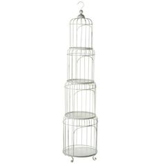 three tiered metal birdcage with wheels on the top and bottom, in white