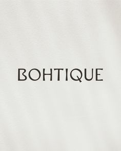 the word boutique written in black on a white background