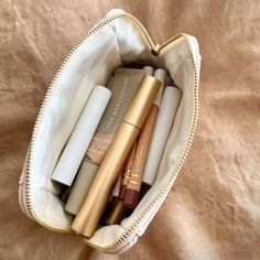 The perfect bag to hold all of your Luk Beautifood cosmetics. This Limited Edition Cosmetic Bag is made from vegan leather in a pretty ever-so-soft-neutral shade with a gold zip and gold embossed Lük Beautifood logo. It holds all Lük makeup items comfortably - Lip Nourish (at least 10) Glow Skint Tint, Lash Nourish Mascara and several Lipstick Crayons! Perfect for travel and keeping your makeup tidy. Easy care wipe down. Environmentally friendly - made from vegan leather with min 40% recycled materials. Fabric certified by Intertek. 100% recycled polyester lining (RPET fabric made from recycled bottles) Size: 190mm x 140mm x 65 mm / 7.5" x 5.5" x 2.6" (LHW) - designed to open wide for effortless makeup selection. Effortless Makeup, Hair Volume Spray, Crayon Lipstick, Travel Makeup Bag, Gift Makeup, Small Makeup Bag, Body Moisturizers, Makeup Concealer, Moisturizing Serum