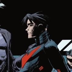 batman and robin wayne standing next to each other