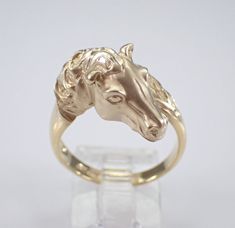 Vintage 14K Yellow Gold Horse Ring. This ring is 14KT Yellow Gold, weighs 5.3 grams and is a finger size 7 1/4, which can be resized (please inquire about sizing with the finger size you need).  I will ship this ring promptly in a gift box. Classic Formal Jewelry With Horse Design, Formal Sterling Silver Jewelry With Horse Design, Elegant Round Jewelry With Horse Design, Elegant Jewelry With Horse Design For Shows, Elegant Horse Design Jewelry For Shows, Classic Gold Jewelry With Horse Design, Timeless 14k Gold Collectible Rings, Elegant Yellow Gold Jewelry With Horse Design, 14k Yellow Gold Jewelry With Horse Design