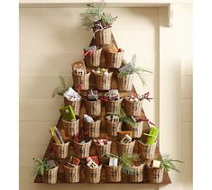 a christmas tree made out of baskets