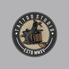 tattoo studio logo with an old style tattoo machine