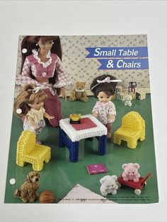 an advertisement for small table and chairs with dolls in the background, including children's toys