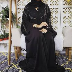 A beautiful handwork embroidered abaya available in all sizes! Black Abaya Designs Dubai Style, Black Abaya Designs Dubai, Abaya Fashion Black, Chanel Embroidery, Abaya Designs Dubai, Abaya Noir, Beautiful Abayas, Embroidered Abaya, Black Abaya Designs