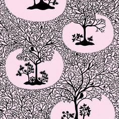 a black and white tree pattern on pink paper with circles in the middle that have trees growing out of them