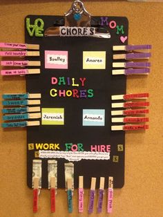 a bulletin board with clothes pins and magnets attached to it that says daily chores