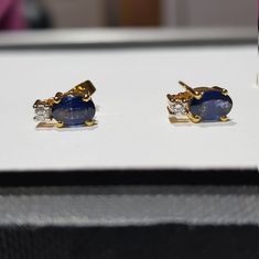 14k solid yellow gold natural ceylon blue sapphire gemstone and natural round brilliant cut shaped diamonds gemstones earrings. 1. The weight of the natural ceylon blue sapphire gemstone used in the earrings =0.90 cts. 2. The weight of the natural diamonds used in the earrings =0.10 cts. 3. The weight of 14k solid yellow gold used in the earrings =1.620 grms. The sapphire is the birthstone for the people born in the month of September. The earring is very nice and beautiful. I have used all my s Sapphire Color Oval Diamond Earrings, Oval Sapphire Earrings With Diamond Accents, Classic Oval Sapphire Diamond Earrings, Blue Sapphire Oval Diamond Earrings, Sapphire Oval Diamond Earrings, Oval Sapphire Earrings Hallmarked, Oval Sapphire Diamond Earrings For Anniversary, Yellow Gold Sapphire Earrings, Yellow Gold Oval Diamond Earrings With Gemstone