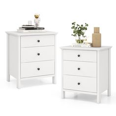 two white nightstands side by side, one with a plant on top and the other with a book