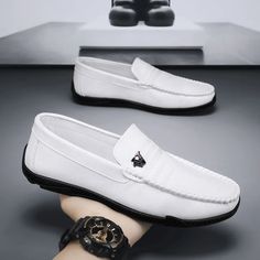 White Leather Men Casual Loafers Step out in style with these white leather men's casual loafers. Crafted for comfort and sophistication, these loafers feature a sleek and versatile design, making them perfect for both casual and semi-formal occasions. The supple white leather adds a touch of elegance, while the slip-on style ensures convenience. Whether you're heading to a brunch or a casual day out, these loafers effortlessly elevate your fashion game. SPECIFICATIONS Shoes Type: Loafers Season Mens Loafers Casual, Formal Dress Shoes, Black Dress Formal, Black Formal, Womens Golf Shoes, Men Loafers, Genuine Leather Shoes, Womens Athletic Shoes, Casual Loafers