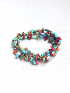 Wrap Handmade colorful Beads Bracelet, Bracelet for teenagers, Bobo Hippie Bracelet, Gifts for her, One of a kind Bracelet. Eclectic bracelet handmade with colorful gemstone, turquoise, red coral, copper findings and glass beads. light and comfortable to wear, avoid water and perfume. Wraps 3 times around 6 to 7 inches wrist. Free shipping with USPS mail, packed and protected in a gift box. Turquoise Wrap Bracelet Gift, Turquoise Wrap Bracelet Great For Gifts, Turquoise Hand-wrapped Hippie Beaded Bracelets, Turquoise Multi-strand Wrap Bracelet As Gift, Eclectic Beaded Bracelets For Beach, Bohemian Hand-strung Wrap Bangle Bracelet, Turquoise Hippie Beaded Bracelets For Jewelry Making, Bohemian Adjustable Charm Bracelet For Friendship, Colorful Bead Wrap Bracelet Gift