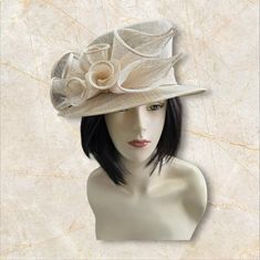 Beautiful ladies mad hat style with uneven crown, great for spring and summer. Ideal for Church, weddings, tea parties  100 % straw with matching bow. Delicate material  OSFA light weight hat Fitted Cream Fedora For Spring, Elegant White Fedora For Spring, Chic Curved Brim Top Hat For Spring, Chic Spring Top Hat With Curved Brim, Formal Summer Beige Straw Hat, Beige Top Hat With Flat Brim For Spring, Beige Flat Brim Top Hat For Spring, Chic Summer Cloche Fascinator, Elegant Fedora Straw Hat For Weddings