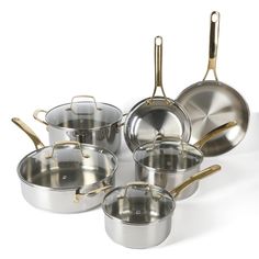 an assortment of stainless steel pots and pans